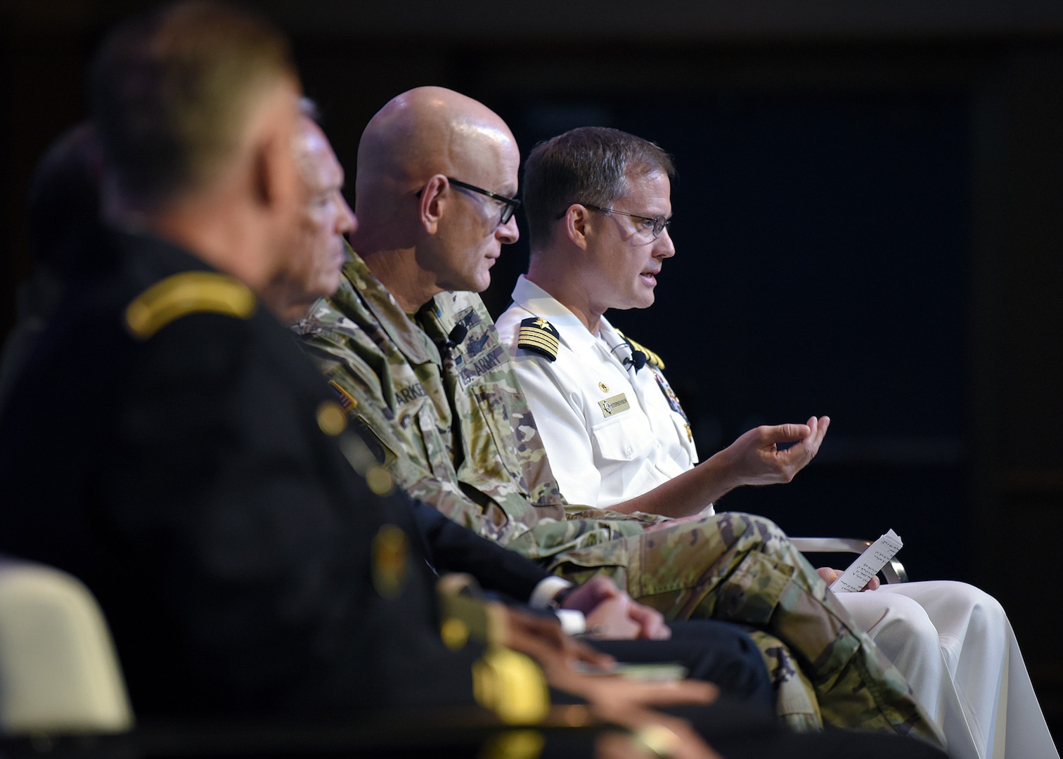Capt. Henry A. Stephenson, right, U.S. Transportation Command director of intelligence, discusses the challenges of intelligence support to cyber defense