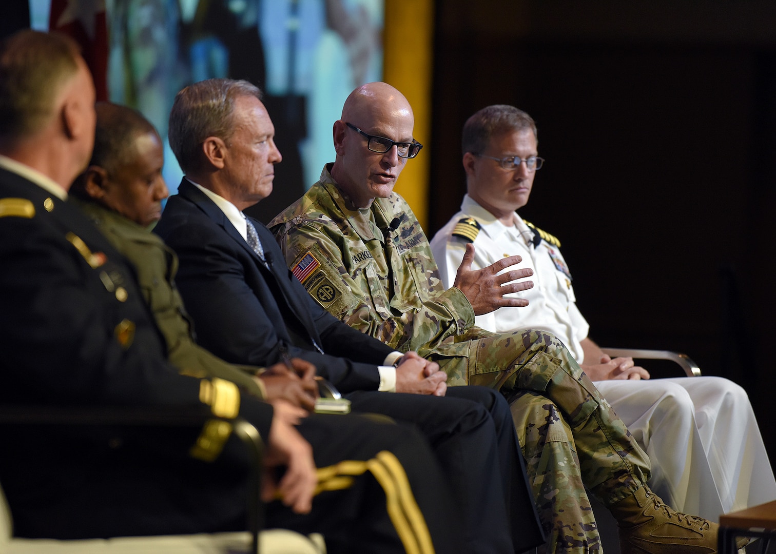 Brig. Gen. Chad J. Parker, National Guard Bureau director of intelligence, second from right, discusses the importance of information sharing during an emergency response during the Defense Intelligence Agency DoDIIS Worldwide Conference Directors of Intelligence panel discussion, Aug. 21, 2019, at the Tampa Convention Center, in Florida.