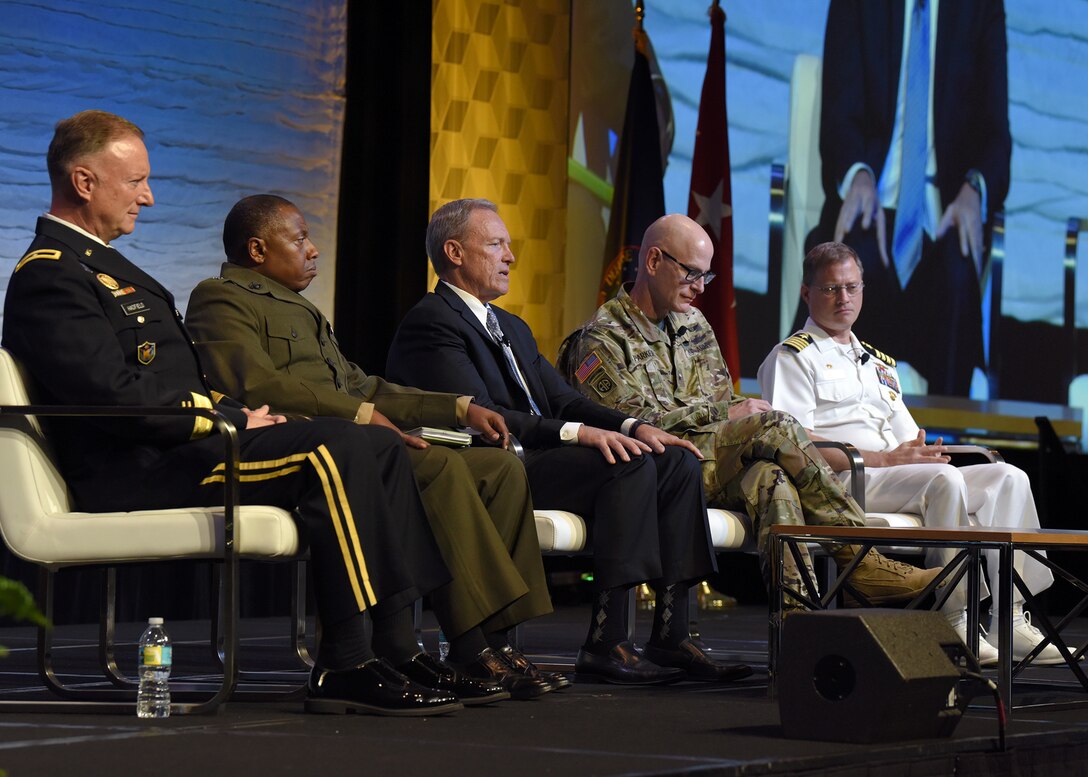 Directors of intelligence from five U.S. military organizations participate in a panel discussion on how artificial intelligence, modernization and information sharing impact military readiness