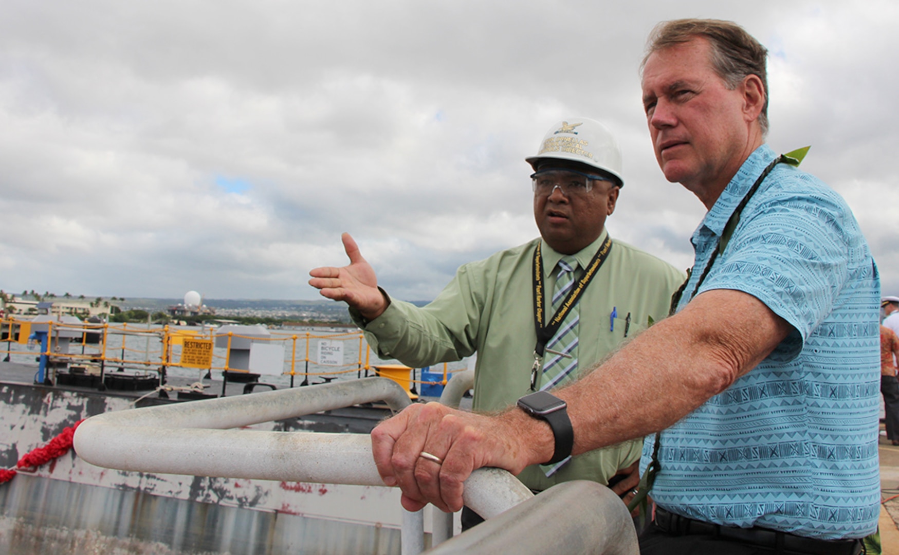 John Ornellas, PHNSY&IMF Director of Radiological Controls (left) explains the significance of Dry Dock One to Rep. Ed Case (right) during the Pearl Harbor Naval Shipyard’s centennial anniversary of Dry Dock One on Aug. 21, 2019, at Dry Dock One.