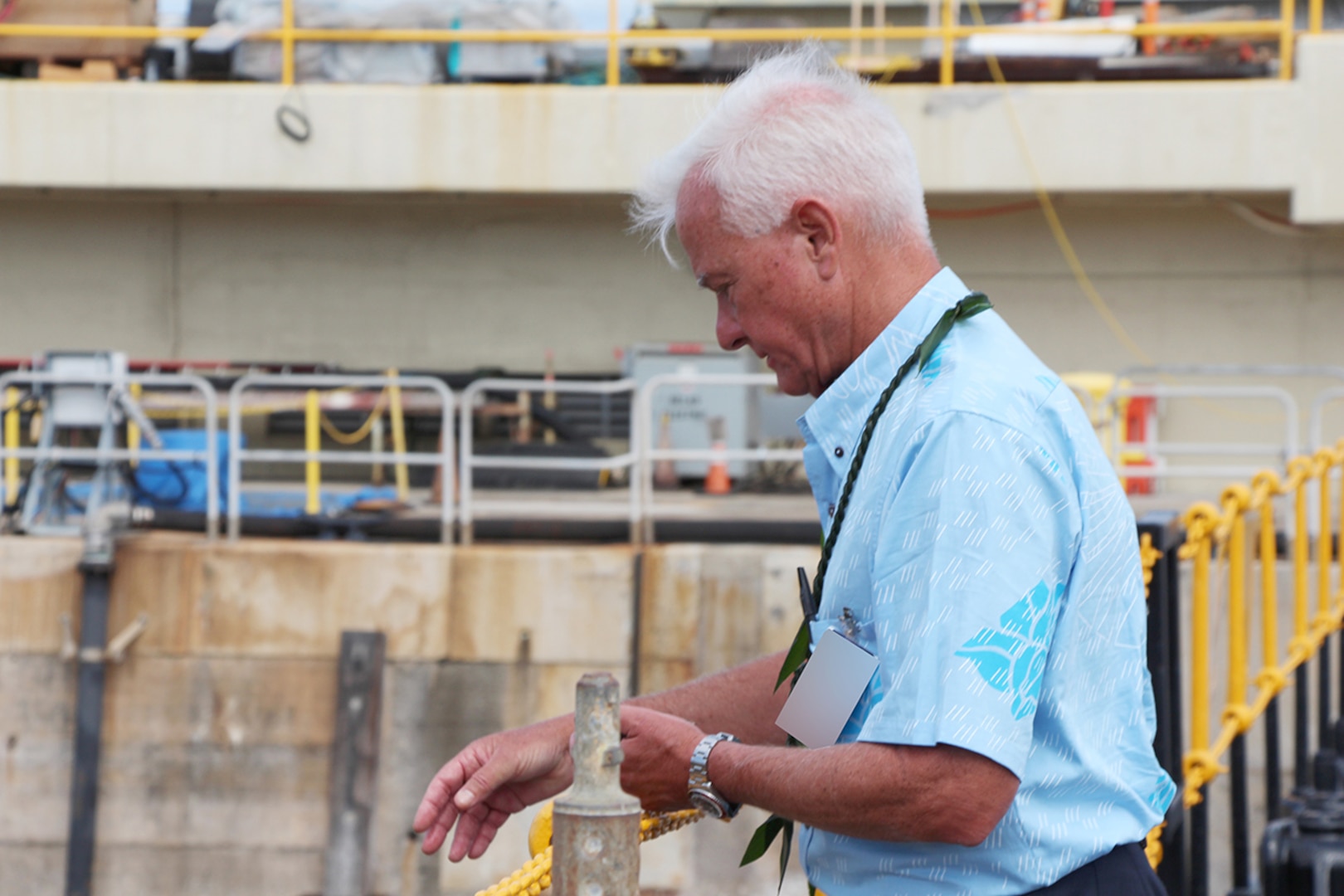 Mayor Kirk Caldwell presents Hawaiian offerings to Dry Dock One at the Pearl Harbor Naval Shipyard’s centennial anniversary of Dry Dock One on Aug. 21, 2019, at Dry Dock One.