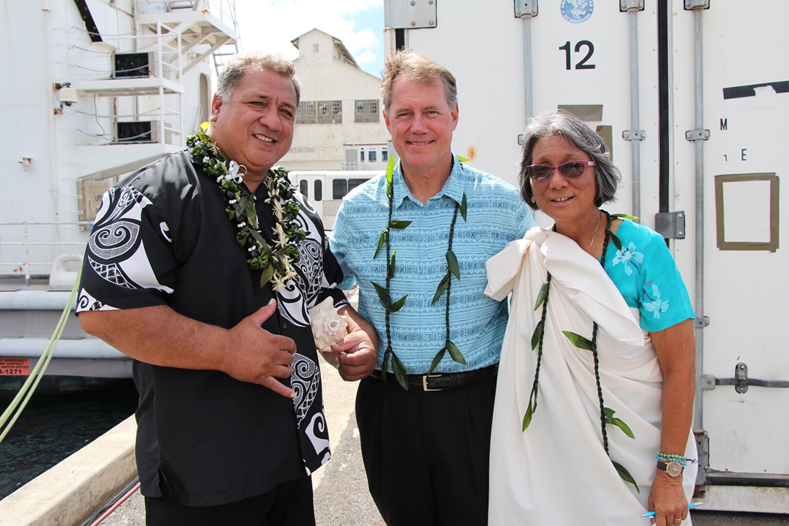 Rep. Ed Case (center), shipyard worker (left), and Ali'i Pauahi Hawaii Civic Club member (right) at Dry Dock One on Aug. 21, 2019.