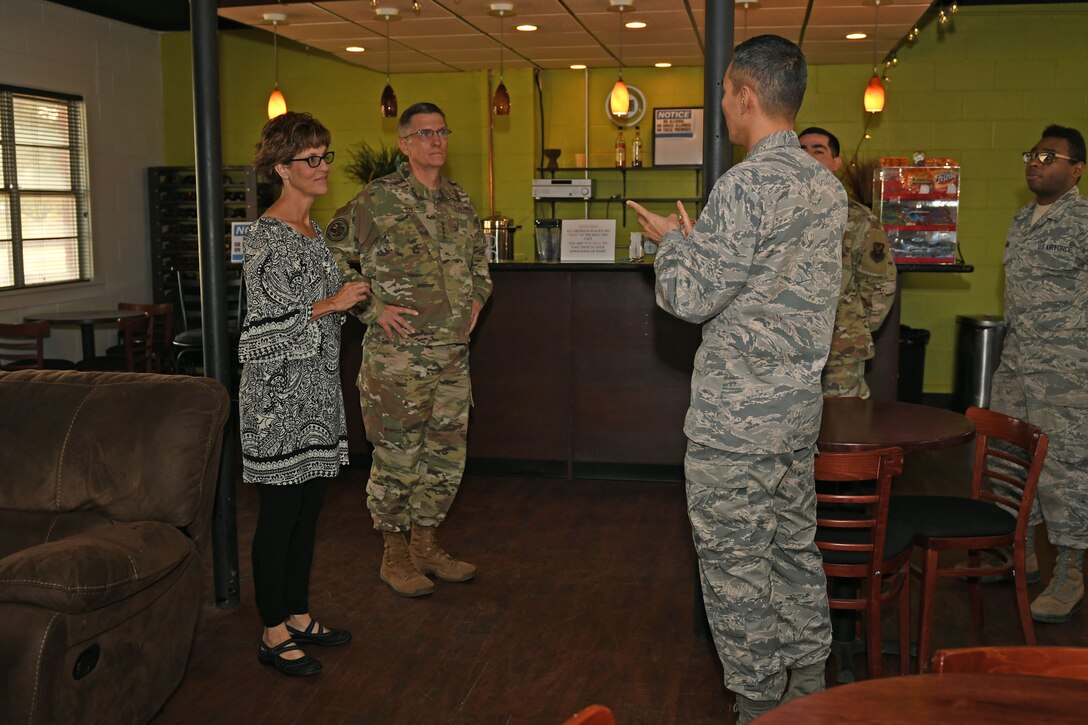 U.S. Air Force Capt. Bermsoo Kim, 7th Bomb Wing chaplain, explains the current ministry of the Soul Fire Cafe to Gen. Tim Ray, Commander of Air Force Global Strike Command, and his wife, Rhonda, at Dyess Air Force Base, Texas, Aug. 22, 2019. The Soul Fire Cafe was started by Ray, his wife and the chaplains while he was in command of the 7th BW in 2008, and was an effort to reach out and build connections between Airmen. (U.S. Air Force photo by Senior Airman Susan Roberts)