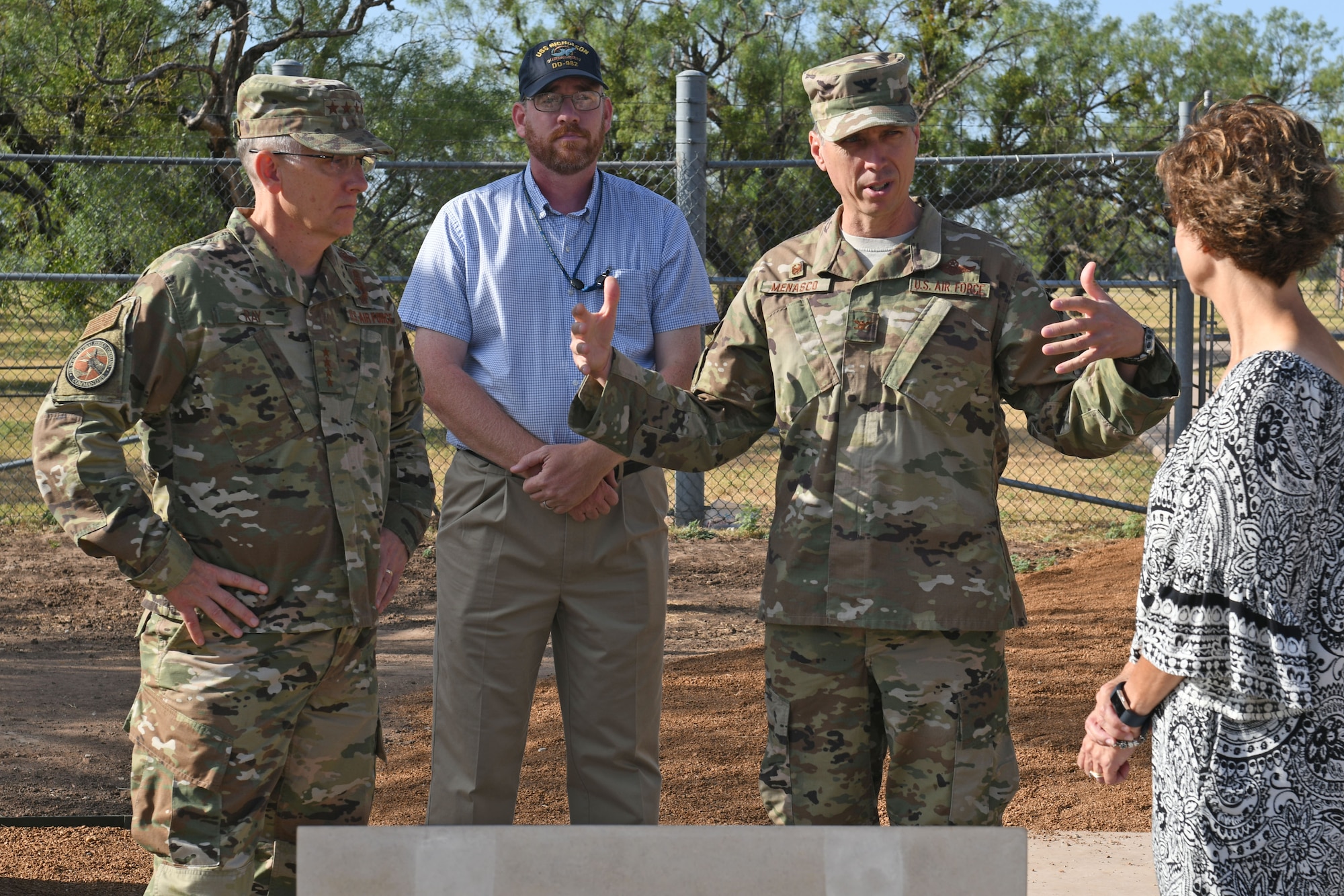 U.S. Air Force Col. Jeffrey Menasco, 317th Airlift Wing commander, middle right, talks with Gen. Tim Ray, Commander of Air Force Global Strike Command, left, his wife, Rhonda, and Walter Nicolds, Dyess museum curator, middle left, at the Dyess Memorial Park just outside of Dyess Air Force Base, Texas, Aug. 22, 2019. The renovated park opened on July 19, 2019, to honor fallen Airmen assigned to Dyess at the time of their death. (U.S. Air Force photo by Senior Airman Susan Roberts)