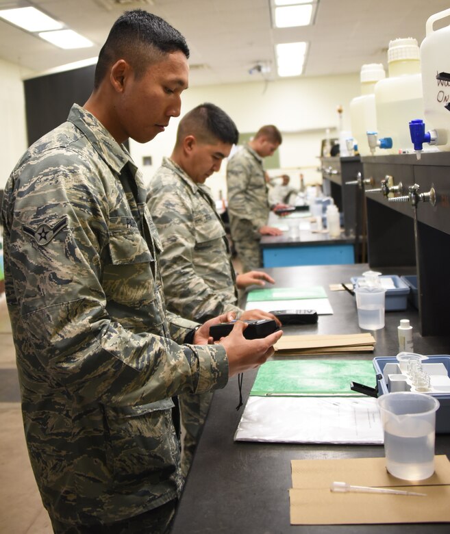 366th Training Squadron water and fuels systems maintenance course students conduct a chlorine test