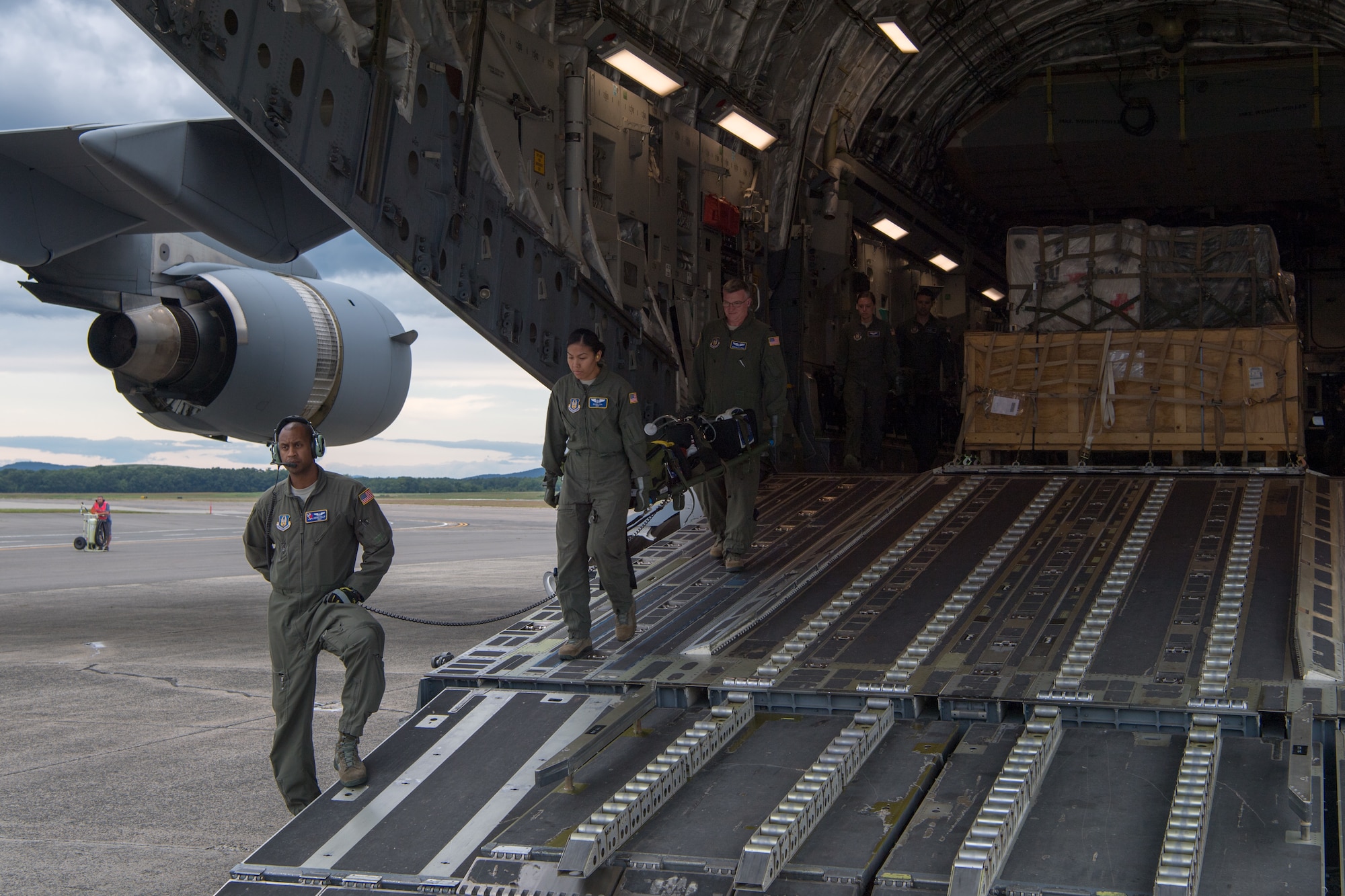 Reserve Citizen Airmen from the 514th Aeromedical Evacuation Squadron, 514th Air Mobility Wing, Joint Base McGuire-Dix-Lakehurst, N.J., assist the 914th AES, Niagara Falls Air Reserve Station, N.Y., in unloading cargo and equipment from a C-17 Globemaster III following the completion of Patriot Warrior 2019, August 24, 2019. Members of the 732nd Airlift Squadron and 514th AES cooperated with various squadrons across the U.S. Air Force Reserve including the 934th Logistics Readiness Squadron, the 439th AES, and the 914th AES, as well as the United Kingdom’s Royal Air Force. Patriot Warrior is the Air Force Reserve Command’s premier exercise, providing an opportunity for Reserve Citizen Airmen to train with joint and international partners in airlift, aeromedical evacuation and mobility support.