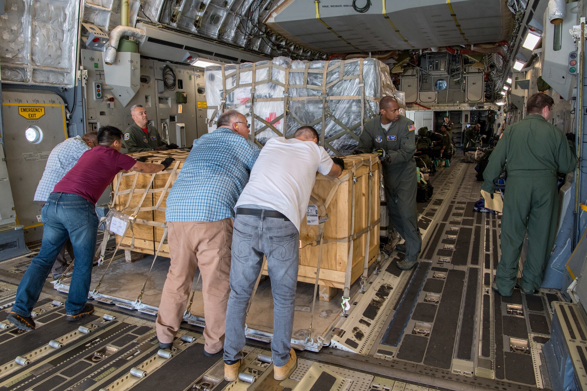 Reserve Citizen Airmen from the 732nd Airlift Squadron, 514th Air Mobility Wing, Joint Base McGuire-Dix-Lakehurst, N.J., and 934th Logistics Readiness Squadron, Minneapolis-St Paul Air Reserve Station, Minn., ensure a pallet of supplies are locked in place on a C-17 Globemaster III following the completion of Patriot Warrior 2019 in Minneapolis-St Paul Air Reserve Station, August 24, 2019. Members of the 732nd AS and 514th Aeromedical Evacuation Squadron cooperated with various squadrons across the U.S. Air Force Reserve including the 934th LRS, the 439th AES, and the 914th AES, as well as the United Kingdom’s Royal Air Force. Patriot Warrior is the Air Force Reserve Command’s premier exercise, providing an opportunity for Reserve Citizen Airmen to train with joint and international partners in airlift, aeromedical evacuation and mobility support.