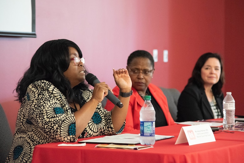 Audrey Robinson, Esq., left, chief of counsel at NASA Marshall Space Flight Center, speaks during a Women’s Equality Day discussion panel at the U.S. Army Engineering and Support Center, Huntsville, Alabama, Aug. 22, 2019. Next to Robinson is Dr. Juanita M. Christensen, executive director of the U.S. Army Combat Capabilities Development Command Aviation and Missile Center, and next to Christensen is Karen Pane, director of Human Resources for the U.S. Army Corps of Engineers.