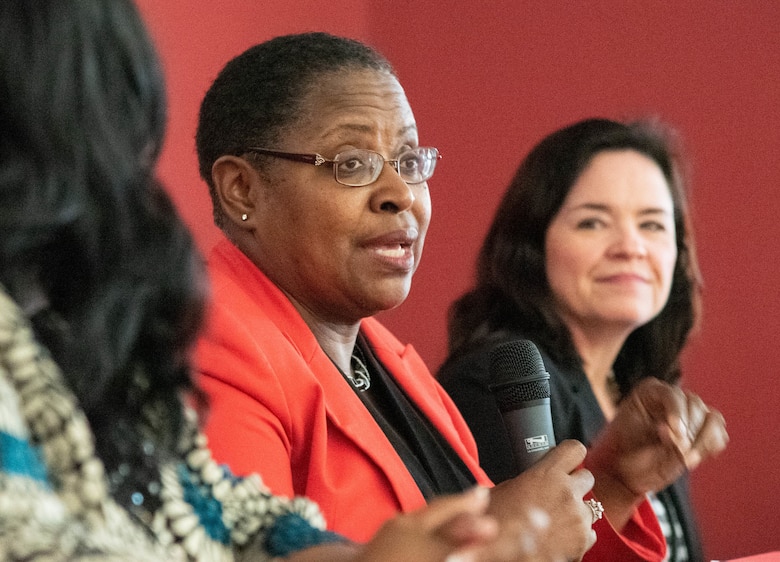 Dr. Juanita M. Christensen, center, executive director of the U.S. Army Combat Capabilities Development Command Aviation and Missile Center, speaks during a Women’s Equality Day discussion panel at the U.S. Army Engineering and Support Center, Huntsville, Aug. 22, 2019. At right is Karen Pane, director of Human Resources for the U.S. Army Corps of Engineers, and at left is Audrey Robinson, Esq., chief of counsel at NASA's Marshall Space Flight Center.