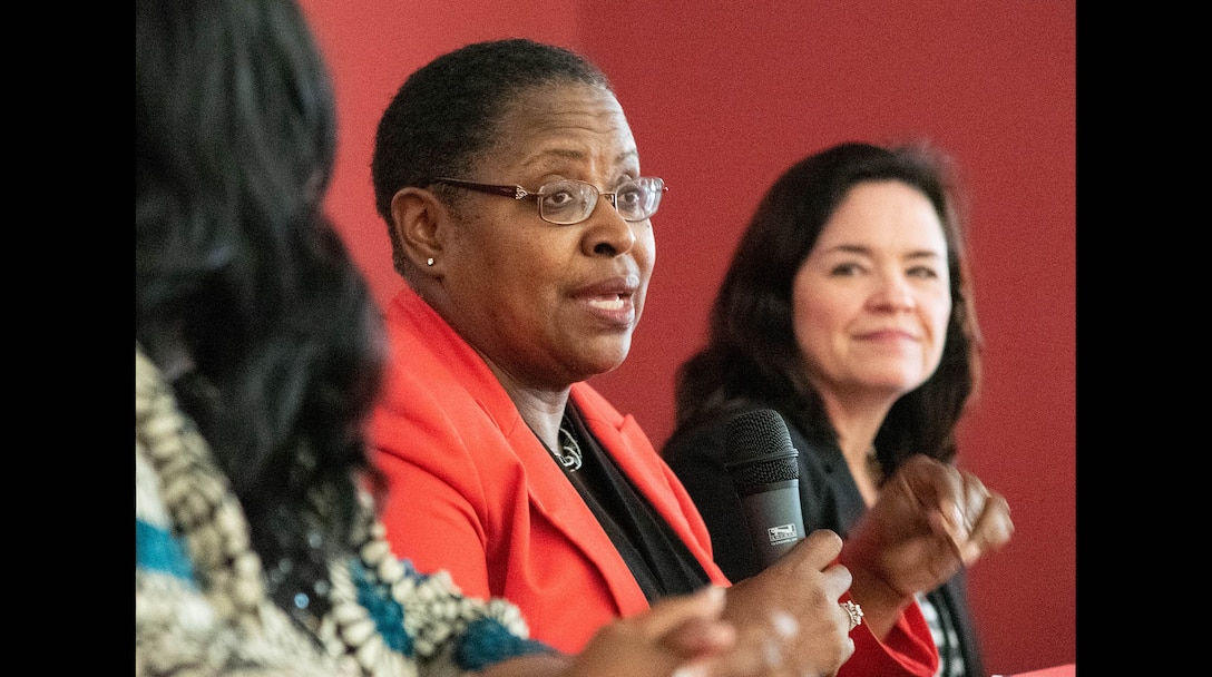 Dr. Juanita M. Christensen, center, executive director of the U.S. Army Combat Capabilities Development Command Aviation and Missile Center, speaks during a Women’s Equality Day discussion panel at the U.S. Army Engineering and Support Center, Huntsville, Aug. 22, 2019. At right is Karen Pane, director of Human Resources for the U.S. Army Corps of Engineers, and at left is Audrey Robinson, Esq., chief of counsel at NASA's Marshall Space Flight Center.