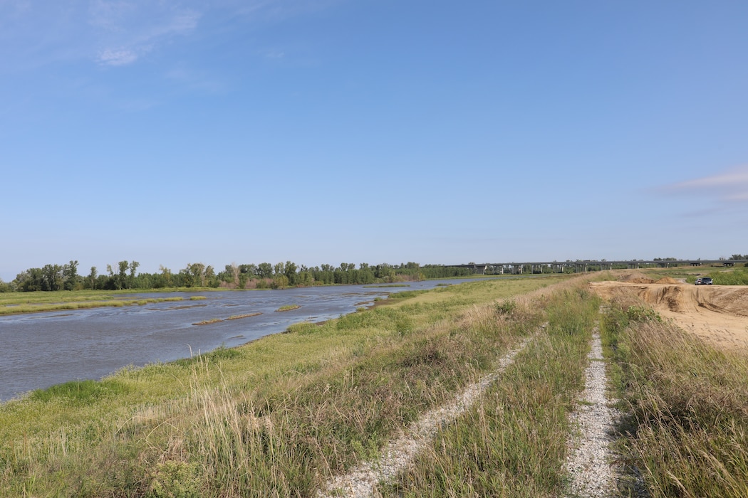 Col. John Hudson and USACE Omaha District employees review progress on Levee L611-614 near Council Bluffs, Iowa Aug. 23, 2019.