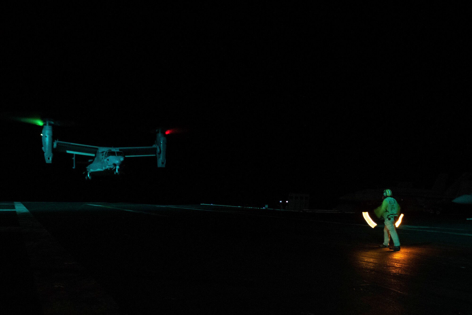 A CV-22 Osprey prepares to land on the flight deck of the USS Ronald Reagan.