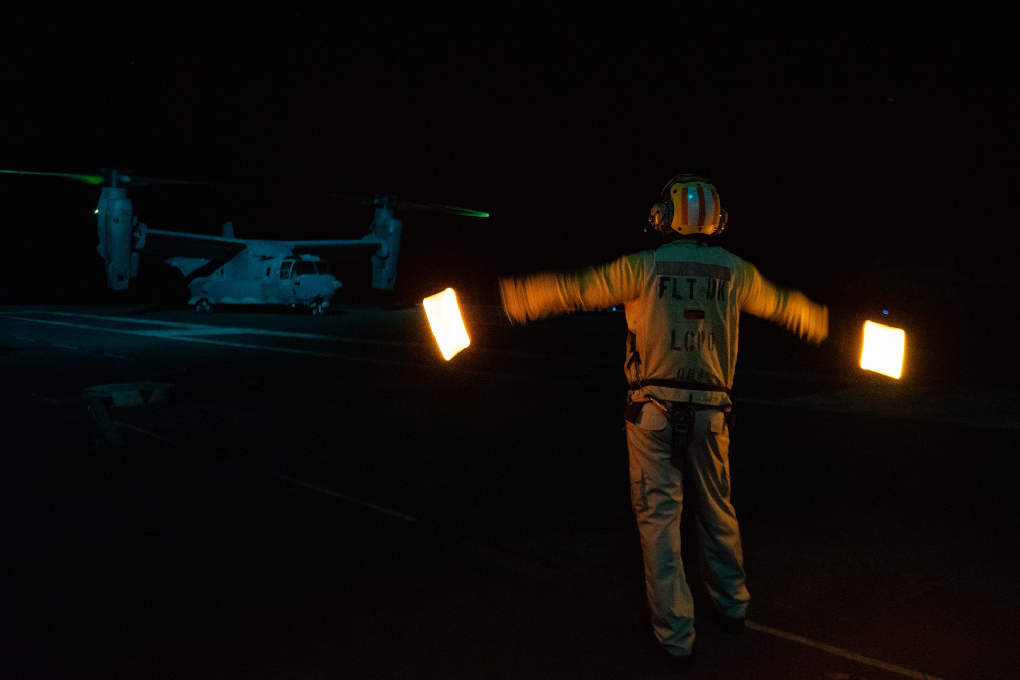 A CV-22 Osprey prepares to take off on the flight deck of the USS Ronald Reagan.