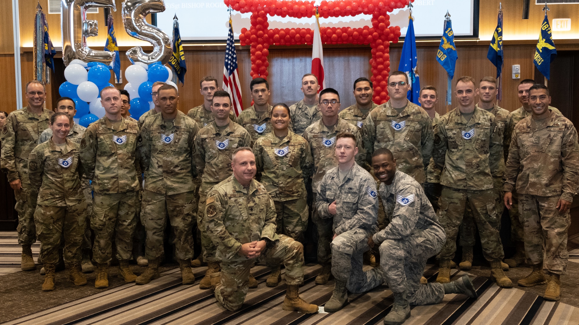 The Kadena Shoguns celebrate their newest staff sergeant selects during a celebration at Kadena Air Base, Japan, Aug. 23, 2019. Across the 18th Wing, 380 senior airmen were selected for promotion to staff sergeant. (U.S. Air Force photo by Staff Sgt. Benjamin Raughton)