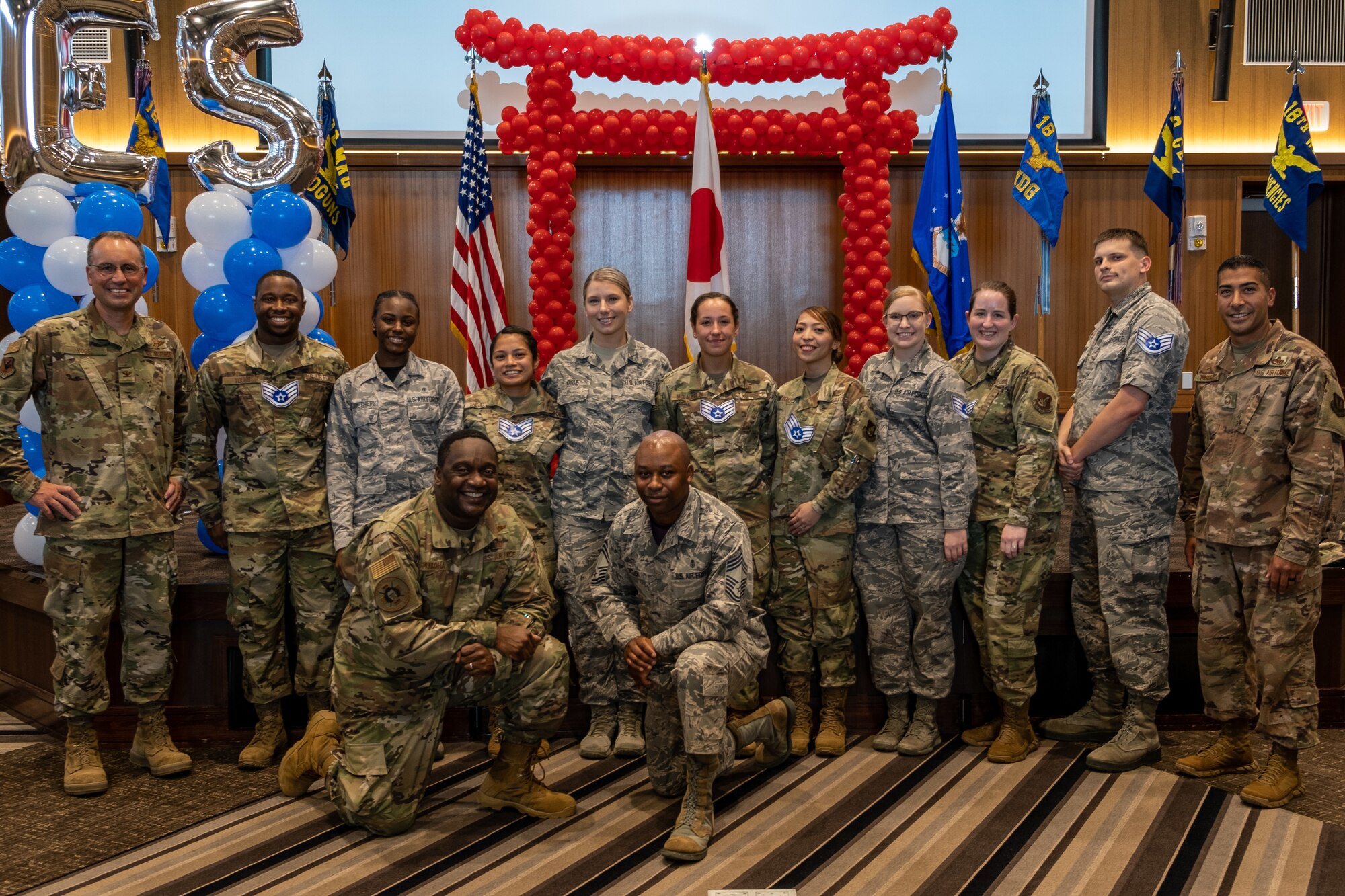 The Kadena Shoguns celebrate their newest staff sergeant selects during a celebration at Kadena Air Base, Japan, Aug. 23, 2019. Across the 18th Wing, 380 senior airmen were selected for promotion to staff sergeant. (U.S. Air Force photo by Staff Sgt. Benjamin Raughton)