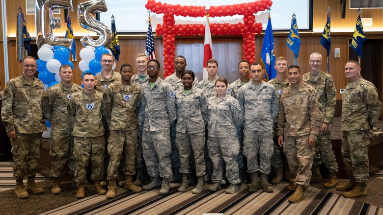The Kadena Shoguns celebrate their newest staff sergeant selects during a celebration at Kadena Air Base, Japan, Aug. 23, 2019. Across the 18th Wing, 380 senior airmen were selected for promotion to staff sergeant. (U.S. Air Force photo by Staff Sgt. Benjamin Raughton)