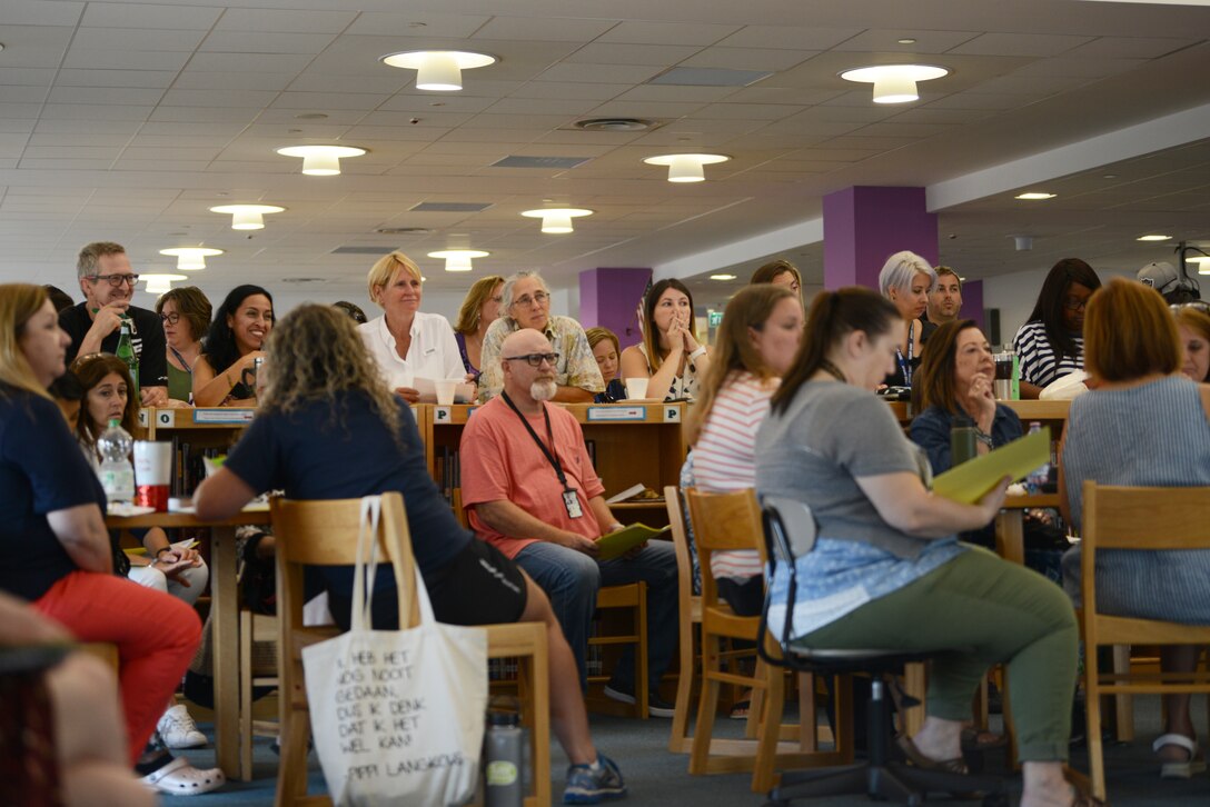 Aviano Elementary School teachers sit during a back to school meeting, Aug. 19, 2019, at Aviano Air Base, Italy. The entire leadership wants to ensure parents and students have all the resources they need to succeed. (U.S. Air Force photo by Airman 1st Class Ericka A. Woolever)