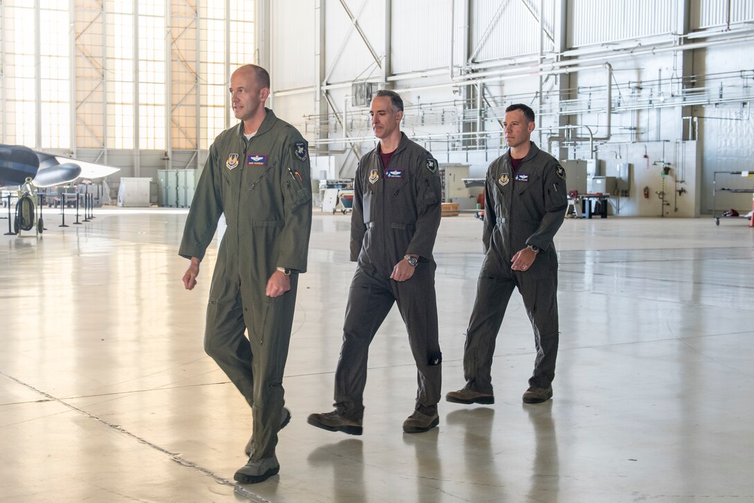 Brig. Gen. E. John "Dragon" Teichert arrives with Col. Christopher J. Spinelli and Col. Timothy J. Spaulding at the changing of the command ceremony.