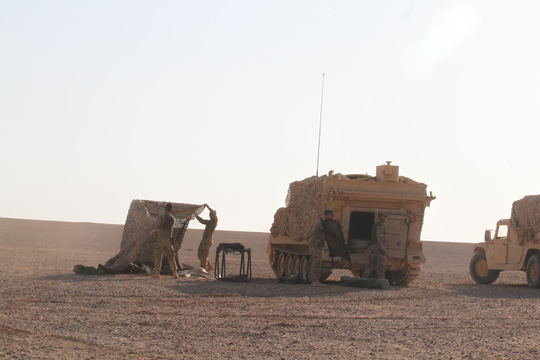 Soldiers with the Medical Platoon, Headquarters and Headquarters Company, 1st Battalion, 68th Armor Regiment, 3rd Armored Brigade Combat Team, 4th Infantry Division, Task Force Spartan set up a role one medical station Aug. 24, 2019, in Jordan as part of their preparations for exercise Eager Lion 19. This multinational exercise is U.S. Central Command’s premiere exercise in the Levant region and is a major training event that provides U.S. forces, Jordan Armed Forces and 28 other participating nations the opportunity to improve their collective ability to plan and operate in a coalition-type environment. (U.S. Army Reserve photo by Sgt. Zach Mott)