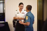 Maj. Tulsi Gabbard, Hawaii Army National Guard military police officer, reviews the operation design process with a Tentara Nasional Indonesia officer during a group breakout in Jakarta, Indonesia, Aug. 19, 2019.