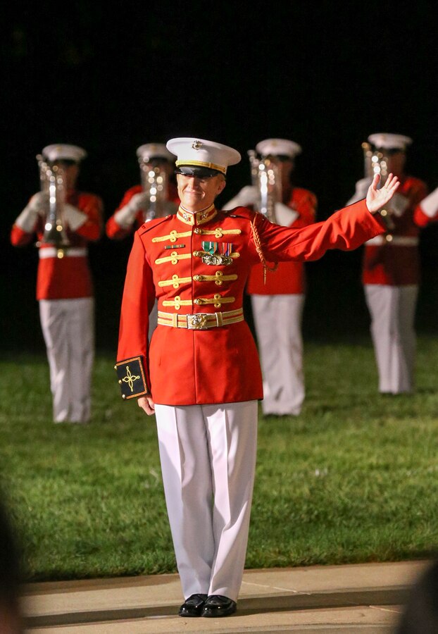 Warrant Officer Courtney Lawrence, operations officer and assistant director, “The Commandant’s Own” U.S. Marine Drum and Bugle Corps, performs during a Friday Evening Parade at Marine Barracks Washington, D.C., Aug. 23, 2019. Lawrence is the first female officer within the ranks of the Drum and Bugle Corps. Lieutenant Gen. Eric Smith, the commanding general, Marine Corps Combat Development Command, and the Deputy Commandant for Combat Development was the hosting official and Mrs. Holly Carter Vega, the 2019 Armed Services Insurance Military Spouse of the Year, was our guest of honor. (U.S. Marine Corps photo by Pfc. Allen Sanders)