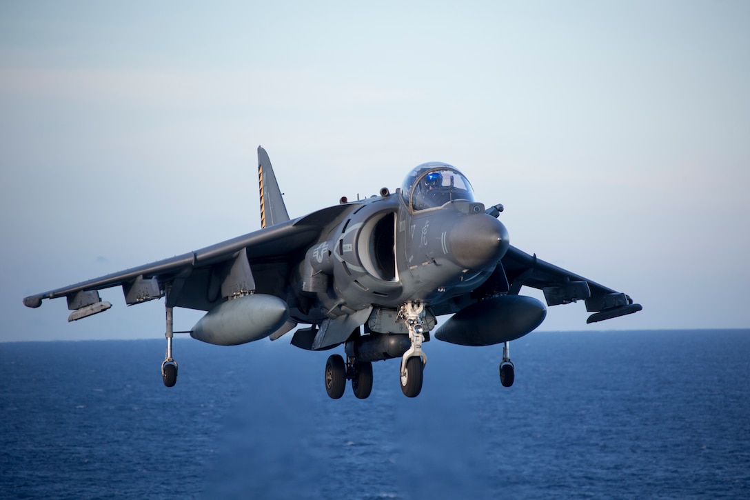 U.S. Marine Corps AV-8B Harriers with Marine Medium Tiltrotor Squadron 365, 26th Marine Expeditionary Unit, conduct deck landing qualification aboard the amphibious assault ship USS Bataan during Amphibious Ready Group, MEU exercise in the vicinity of Camp Lejeune, North Carolina, Aug. 23, 2019. ARGMEUEX provides essential and realistic ship-to-shore training, designed to enhance the integration of the Navy-Marine Corps team. Additionally, ARGMEUEX provides an opportunity to integrate unique individual and unit skills and develop the ARG and MEU’s collective proficiency in challenging and unfamiliar environments.