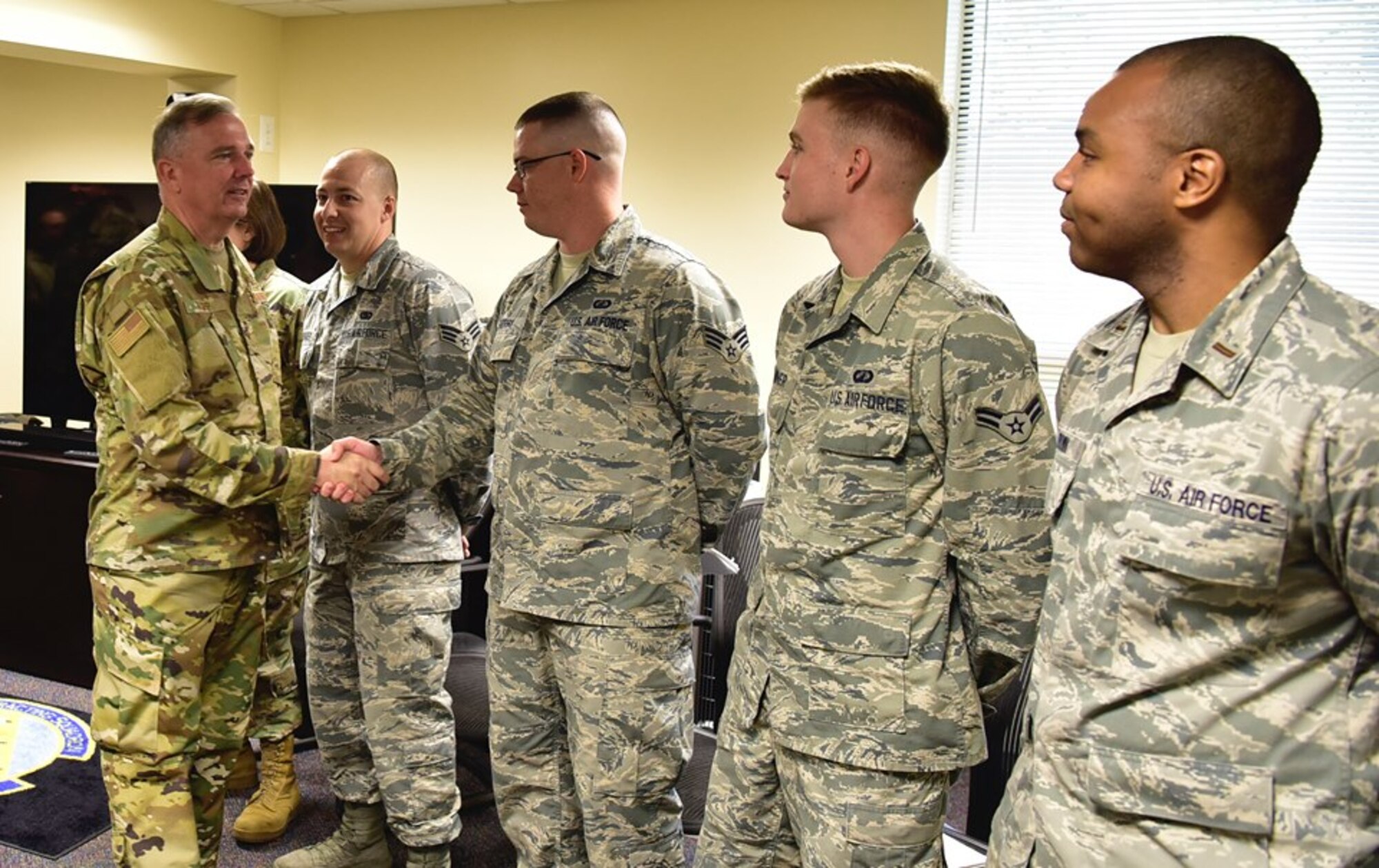 Air Force District of Washington Commander Maj. Gen. Ricky N. Rupp meets with Airmen from the 11th Wing during his immersion visit here Aug. 20.
