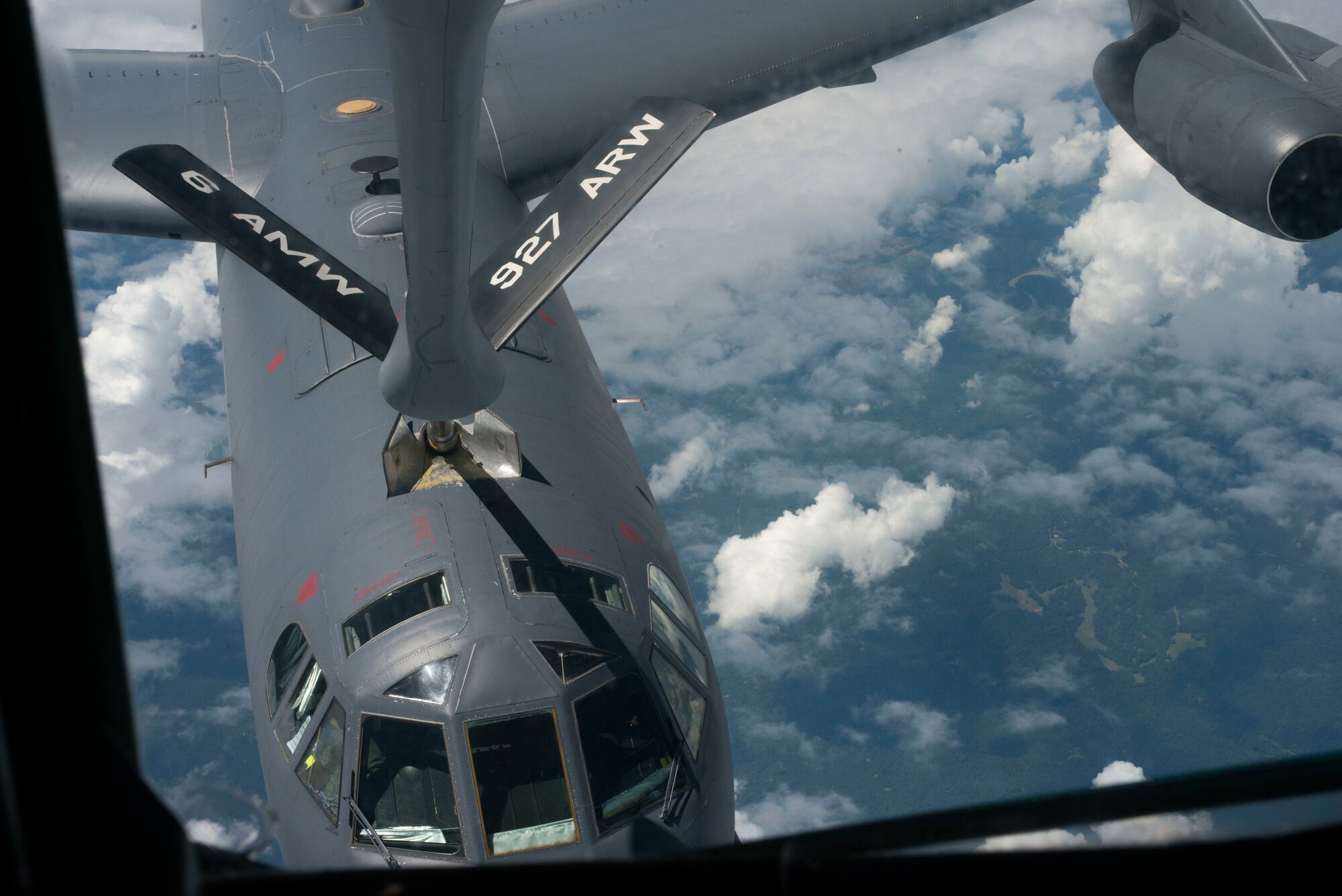 A U.S. Air Force KC-135 Stratotanker refuels a B-52 Stratofortress assigned to Barksdale Air Force Base above Miss. Aug. 21, 2019. For over 60 years the KC-135 has been delivering unmatched air refueling, enabling rapid global mobility. (U.S. Air Force photo by Senior Airman Frank Rohrig)