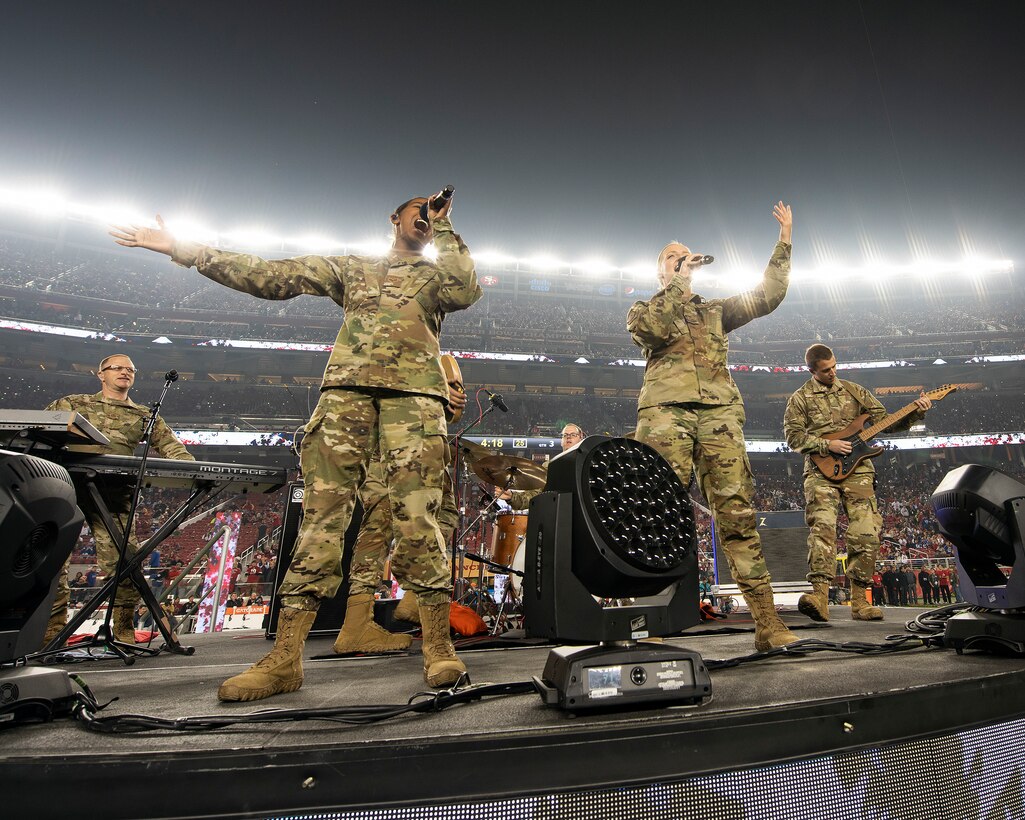 The U.S. Air Force Band of the Golden West from Travis Air Force Base, California, perform during halftime of the San Francisco Forty-Niners and New York Giants Monday Night Football game at Levi’s Stadium in Santa Clara, California, Nov. 12, 2018. The band performed in honor of Veterans Day and to support the National Football League’s Salute to Service Campaign. (U.S. Air Force photo by Louis Briscese)