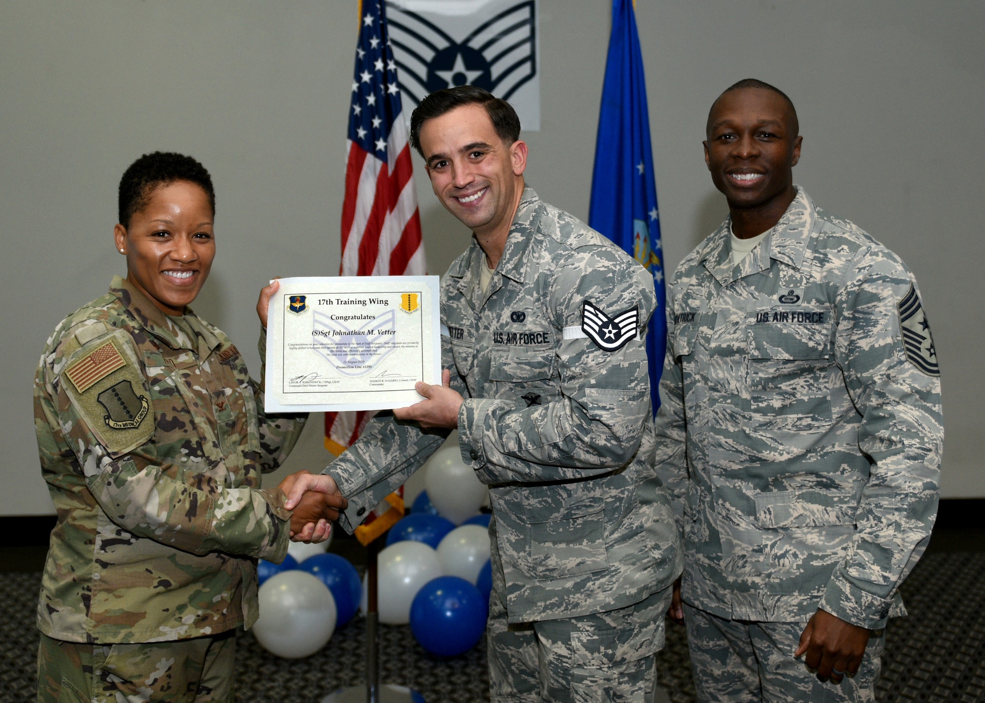 U.S. Air Force Staff Sgt. select Johnathan Vetter, 17th Security Forces Squadron, receives his promotion certificate during the staff sergeant release party at the event center on Goodfellow Air Force Base, Texas, August 23, 2019. Staff sergeants are highly trained technicians with supervisory and training responsibilities. (U.S. Air Force photo by Airman 1st Class Robyn Hunsinger/Released)