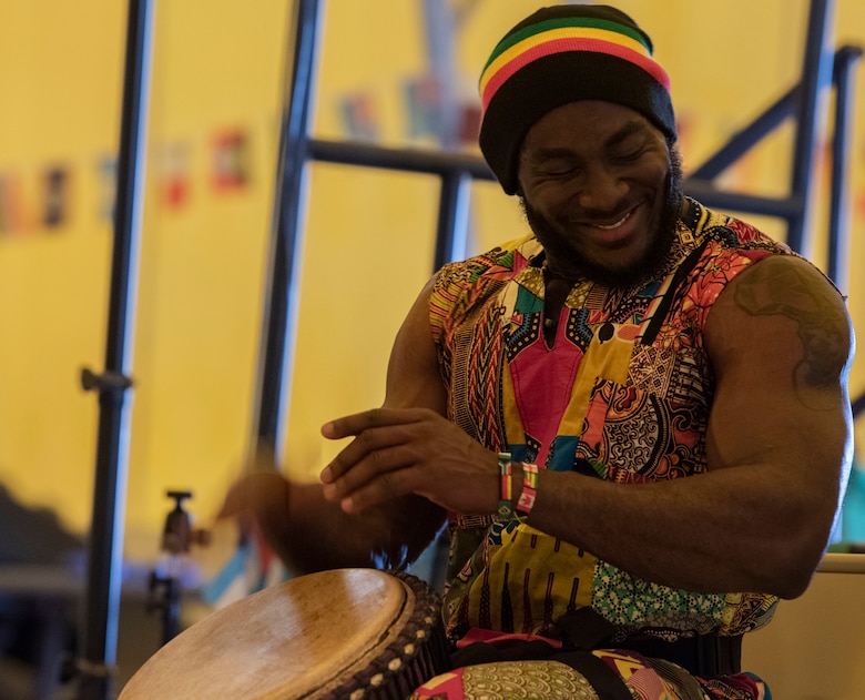 SCHRIEVER AIR FORCE BASE, Colo. – Emmanuel Nii Bortey Annang, an African drummer, beats a drum at an annual diversity day event at Schriever Air Force Base, Colorado, Aug. 23, 2019. The event featured booths from different cultures as well as cultural foods for Airmen to enjoy. (U.S. Air Force photo by Airman 1st Class Jonathan Whitely)