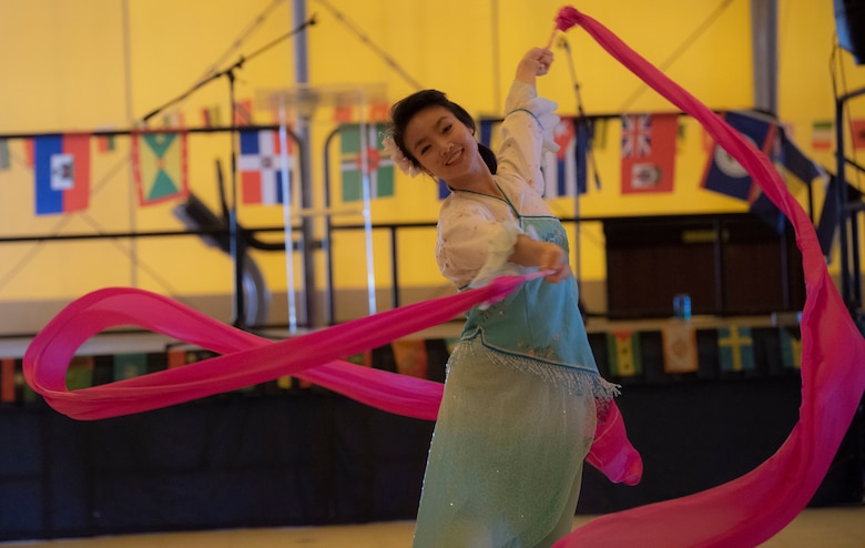 SCHRIEVER AIR FORCE BASE, Colo. – Teresa Yeh, dancer, performs a Chinese Dance at an annual diversity day event at Schriever Air Force Base, Colorado, Aug. 23, 2019. During the event, dancers from different cultures performed to spread cultural awareness to members of Team Schriever. (U.S. Air Force photo by Airman 1st Class Jonathan Whitely)