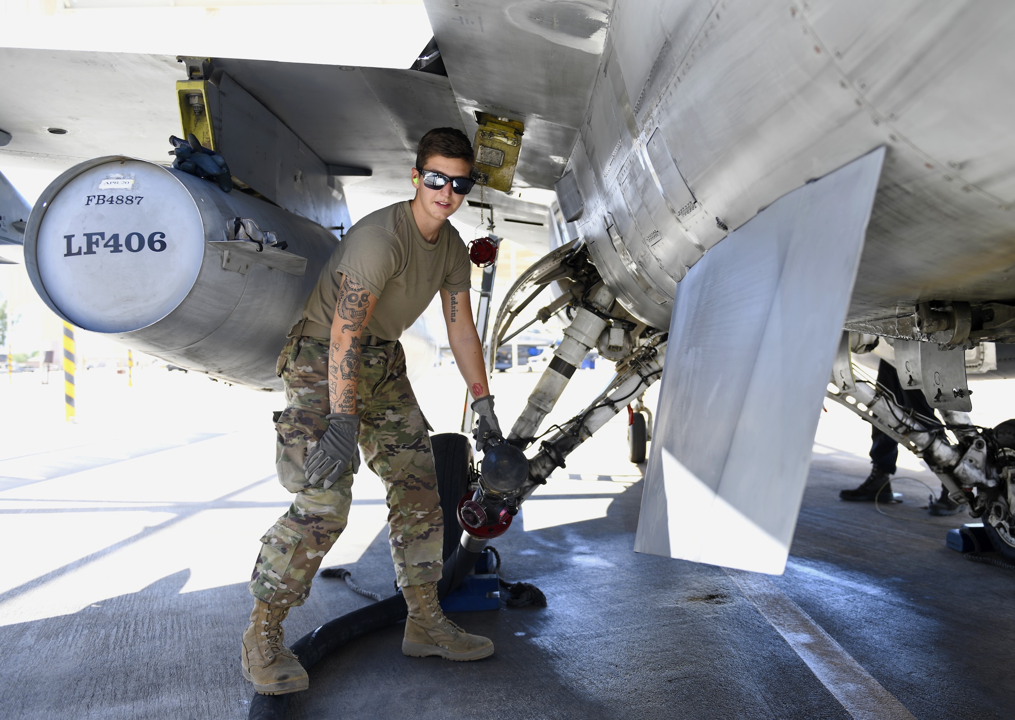 Airman 1st Class Katlynn Masnyk, 56th Logistics Readiness Squadron distribution fuels operator, refuels an F-16 Fighting Falcon Aug. 21, 2019, at Luke Air Force Base, Ariz.