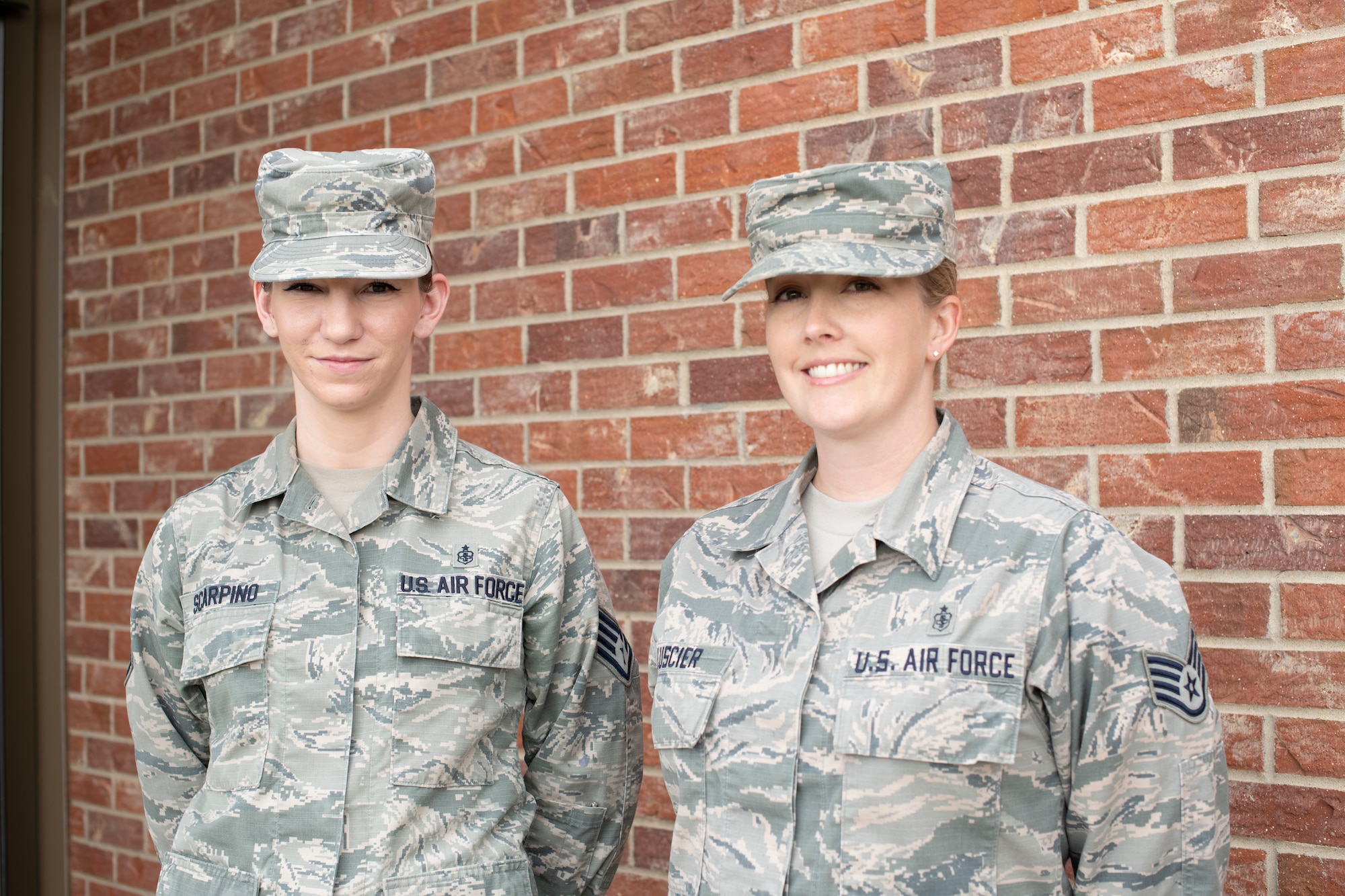 Staff Sgt. Amanda Scarpino, left, noncommissioned officer in charge of preventive dentistry at the 21st Medical Group dental clinic on Peterson Air Force Base and Staff Sgt. Megan Luscier, 21st Medical Squadron NCOIC of instrument processing at Schriever AFB, pose for a photo Aug. 8, 2019 at Peterson Air Force Base, Colorado. Scarpino and Luscier were recently selected to be Peterson AFB Airman Leadership School instructors. (U.S. Air Force photo by Heather Heiney)