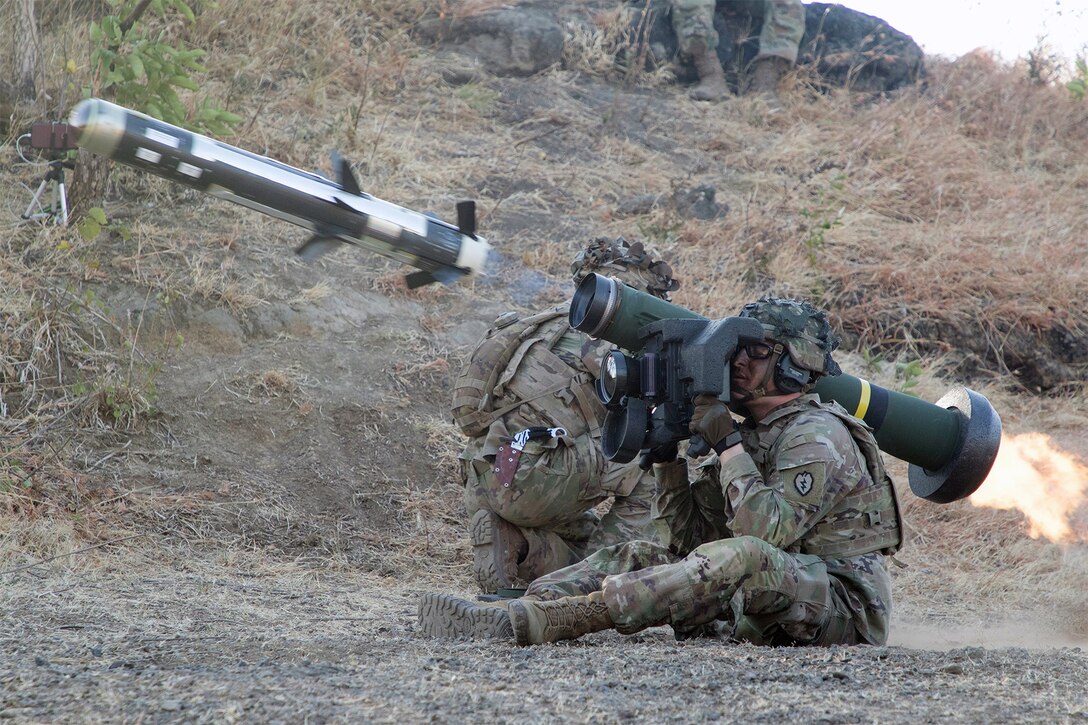 A soldier fires a Javelin.