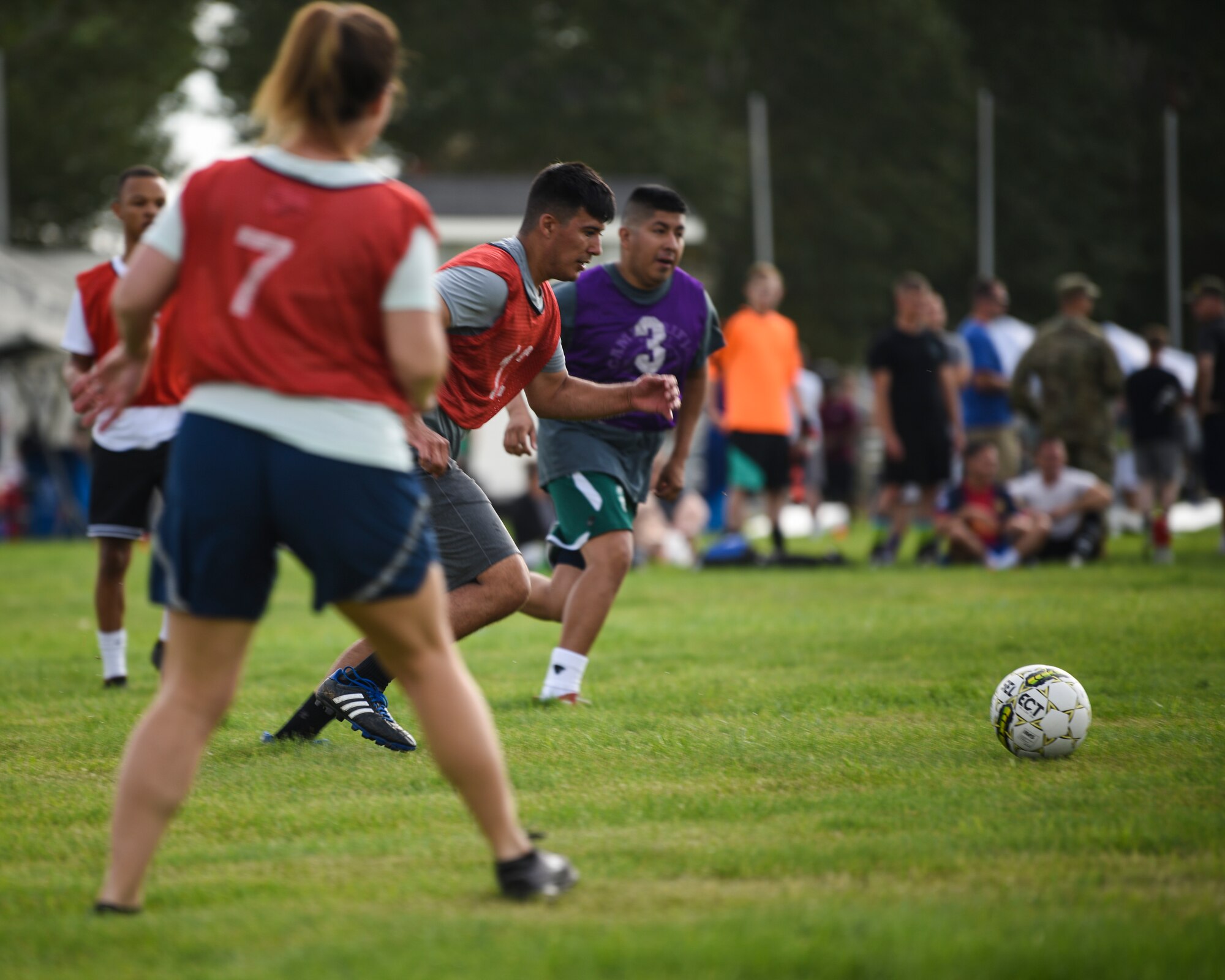 Two squadrons play in a soccer match on Aug. 23, 2019, during the annual Frontiercade on F.E. Warren Air Force Base, Wyo. During Frontiercade, there were multiple sports and games including, volleyball, ultimate Frisbee, corn hole and basketball. (U.S. Air Force photo by Staff Sgt. Ashley N. Sokolov)