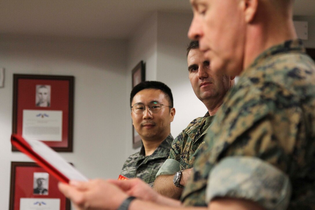 U.S. Marine Corps Forces Korea (MARFORK) honors Captain Ko Hyun Jong for serving as the Republic of Korea Marine Corps Liaison Officer to MARFORK Aug. 26. Capt. Ko plays a critical role in assisting MARFORK during operations by serving as a vital link between two staffs from two separate nations. Liaison Officers from both the U.S. Marine Corps and ROK Marine Corps continue the tradition of brotherhood between the two services and build upon the ROK-US Alliance that has stood for over 70 years. (U.S. Marine Corps Photo by Sgt. Paker Golz)