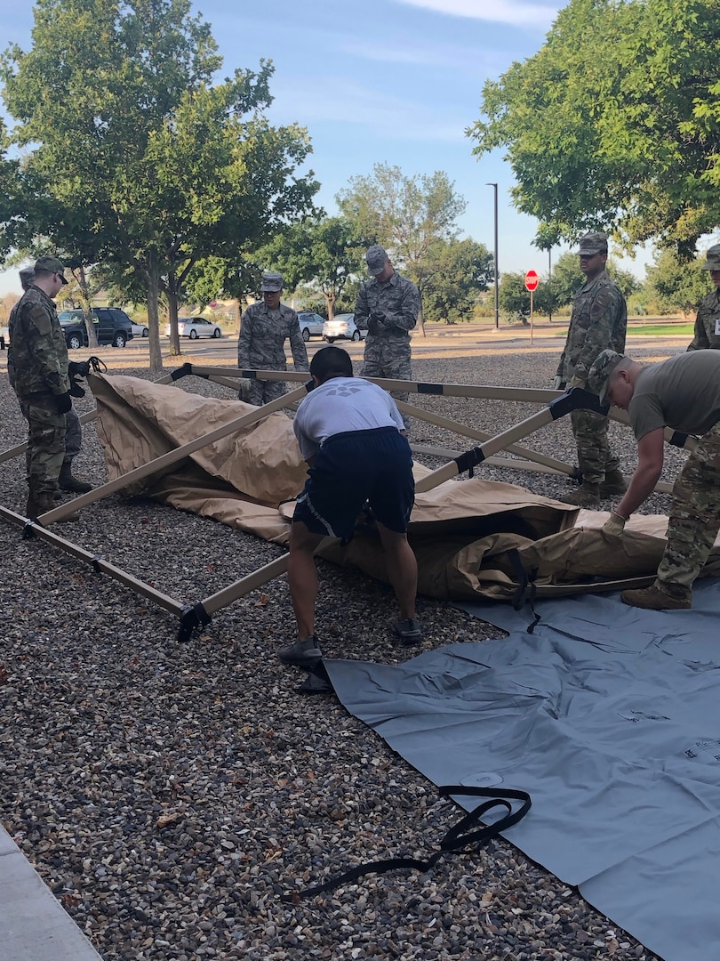 U.S. Air Force Airmen set up an Air Transportable Clinic August 17, 2019, on Mountain Home Air Force Base, Idaho. Setting up the ATC gave medics an opportunity to see what challenges they may face before they are deployed. (Courtesy photo)