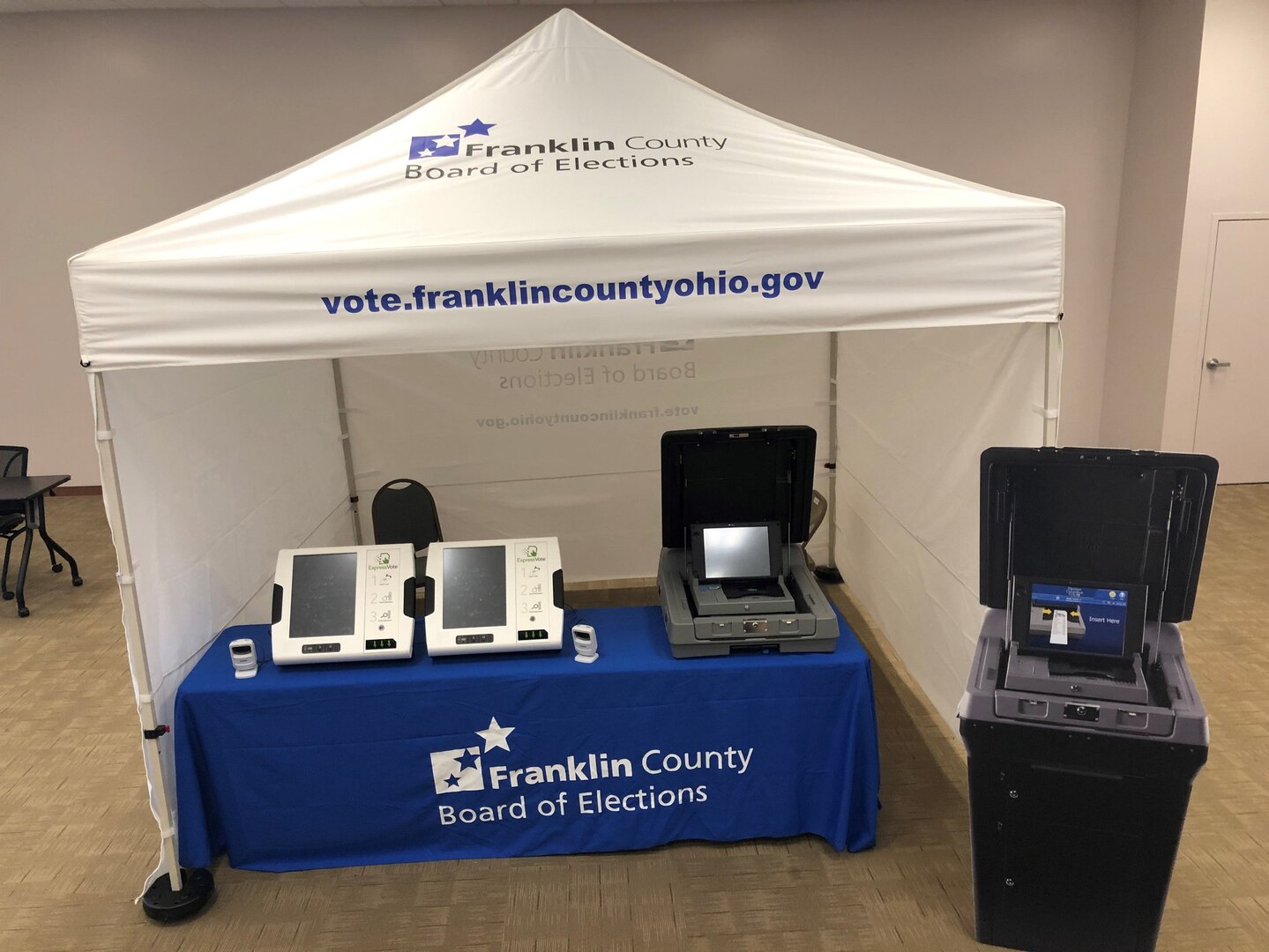 Table display with touch-screen voting machine and ballot scanner