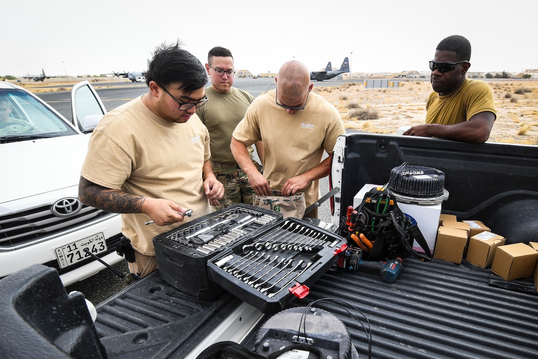 Members from the 386th Expeditionary Civil Engineer Squadron pick out tools for a maintenance job at Ali-Al Salem Air Base, Kuwait, Aug. 14, 2019. The mission for all civil engineer Airmen is to ensure all buildings and facilities continue to run effectively and maintain combat-readiness. (U.S. Air Force photo by Senior Airman Lane T. Plummer)