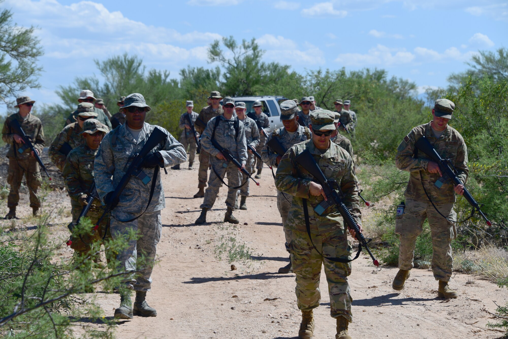 a photo of airmen practicing patrol techniques
