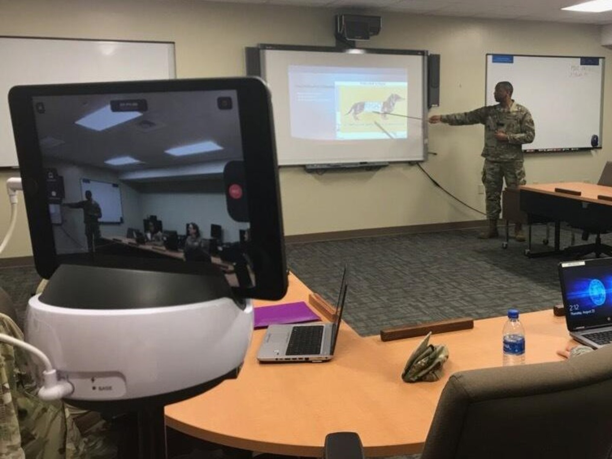 A basic instructor course instructor conducts a lecture while using the Swivl video robot on Keesler Air Force Base, Mississippi, August 27, 2019. Swivl is a video robot designed to allow students to assess their own performance in the classroom, while increasing student engagement and supporting the Student-Centered Active Learning Environment with Upside-down Pedagogies learning model. Swivl gives students more ownership of their learning while reinforcing student interaction learning strategies: student-to-content, student-to-student, and student-to-instructor.
