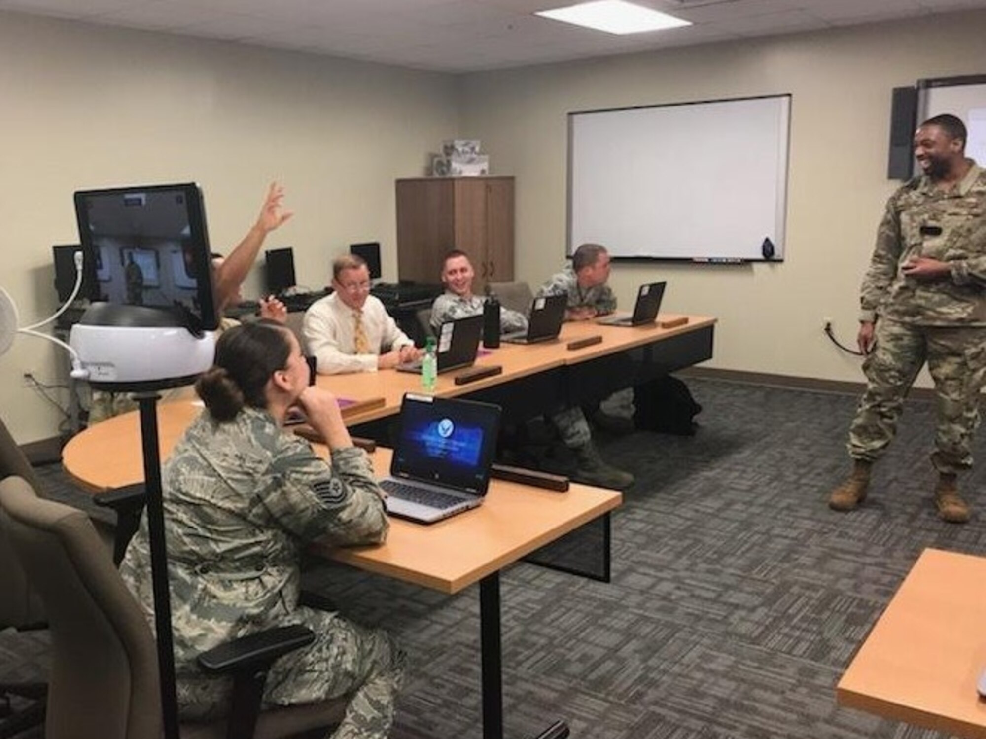 A basic instructor course instructor conducts a lecture while using the Swivl video robot on Keesler Air Force Base, Mississippi, August 27, 2019. Swivl is a video robot designed to allow students to assess their own performance in the classroom, while increasing student engagement and supporting the Student-Centered Active Learning Environment with Upside-down Pedagogies learning model. Swivl gives students more ownership of their learning while reinforcing student interaction learning strategies: student-to-content, student-to-student, and student-to-instructor.