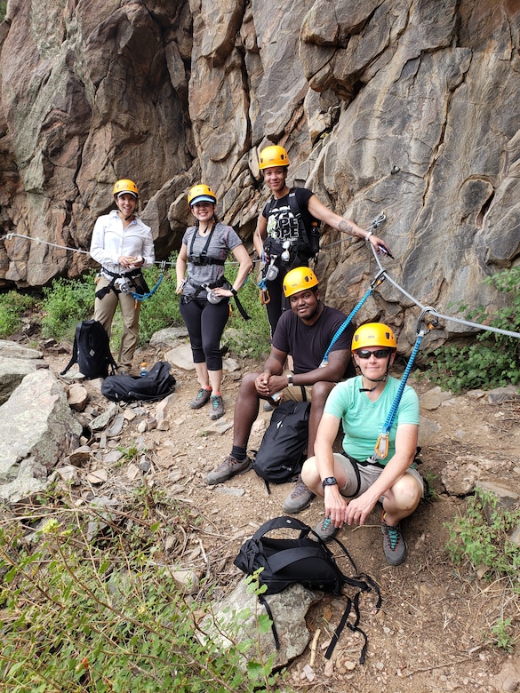 Schriever Airmen rest during their hike/climb at the Royal Gorge Via Ferrata at Cañon City, Colorado, Aug. 24, 2019. The Schriever Outdoor Recreation office hosts fully arranged trips based on different outdoor activities all around Colorado at discounted prices. (U.S. Air Force courtesy photo)