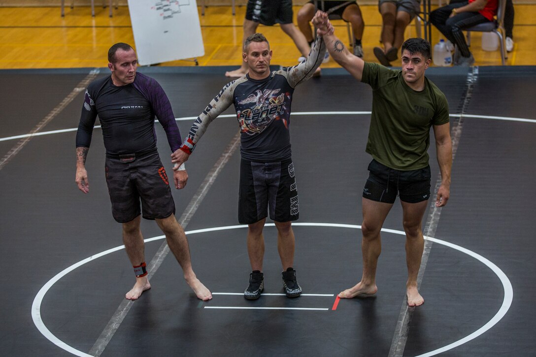 U.S. Marines stationed at Marine Corps Air Station (MCAS) Yuma and civilians from the Yuma community, participate in the Semper Fit Grappling Tournament at the station gym, August 23, 2019. The tournament consisted of four different catoregories based off weight and experience level. (U.S. Marine Corps photo by Cpl. Sabrina Candiaflores)
