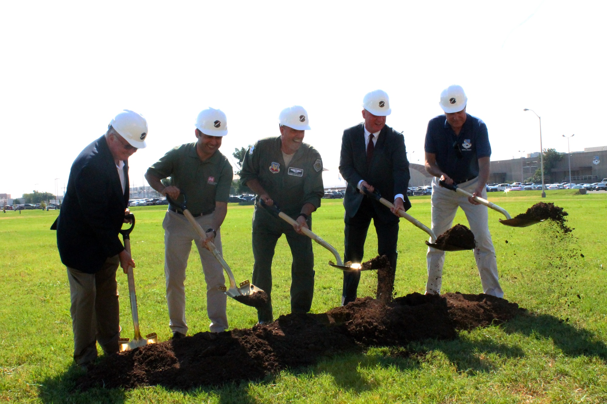Members of the 552nd Air Control Wing leadership, civil engineering, and the U.S. Army Corps of Engineers celebrate the groundbreaking of an E-3 Sentry Consolidated Simulator Building at Tinker Air Force Base on August 16, 2019. This new building will house the E-3 DRAGON Flight Deck Sims, E-3 Mission sims, and Command and Reporting Center mission sims. (U.S. Air Force photo by 2nd Lt. Ashlyn K. Paulson)
