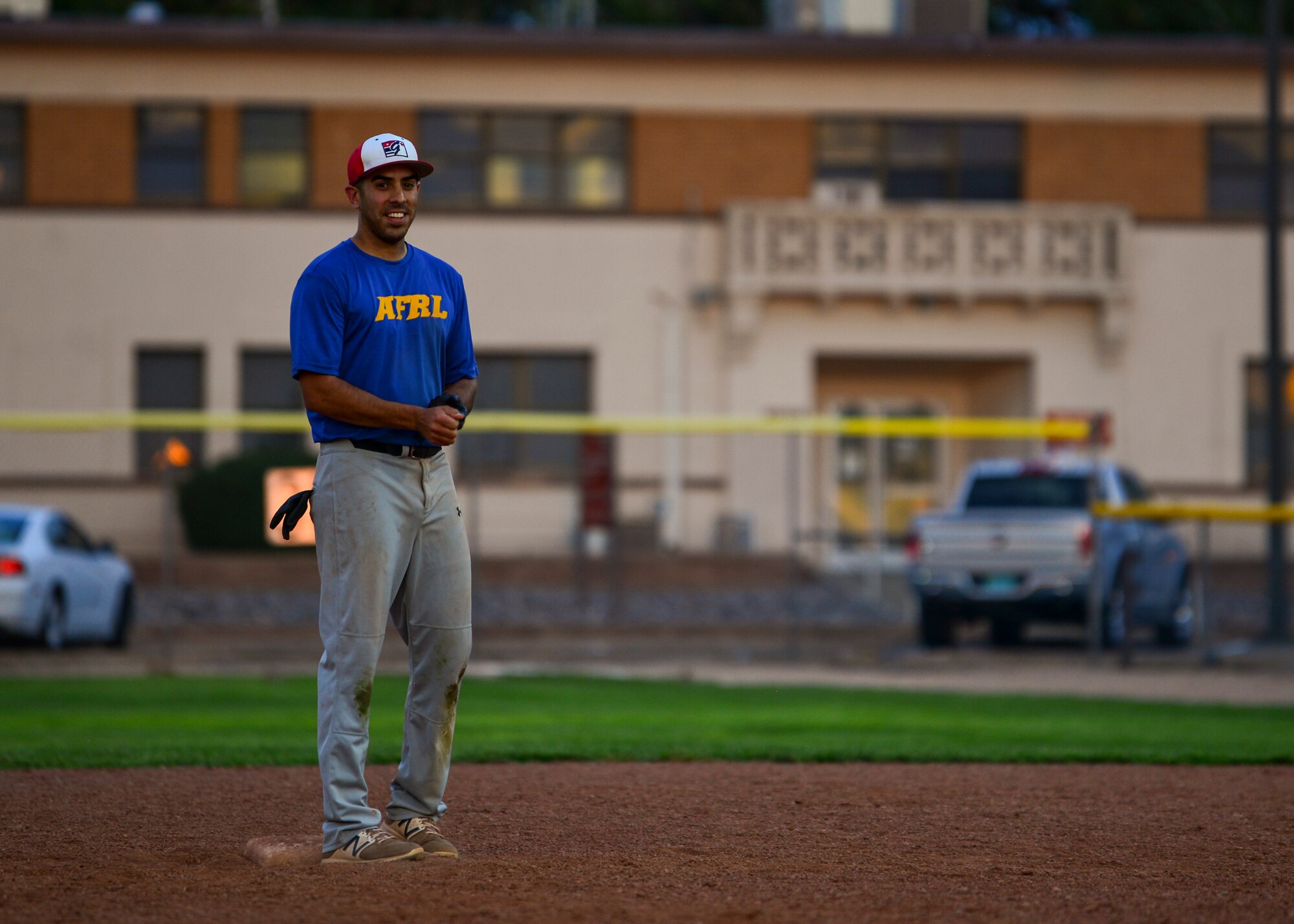 Marcus Mansfield, outfielder for Team AFRL, stands at second base during the 2019 Kirtland Softball Intramural Championship Game at Kirtland Air Force Base, N.M., August 22, 2019. The championship game was a seven-inning game with Team AFRL beating Team SFS with a final score of 26-22. (U.S. Air Force photo by Airman 1st Class Austin J. Prisbrey)