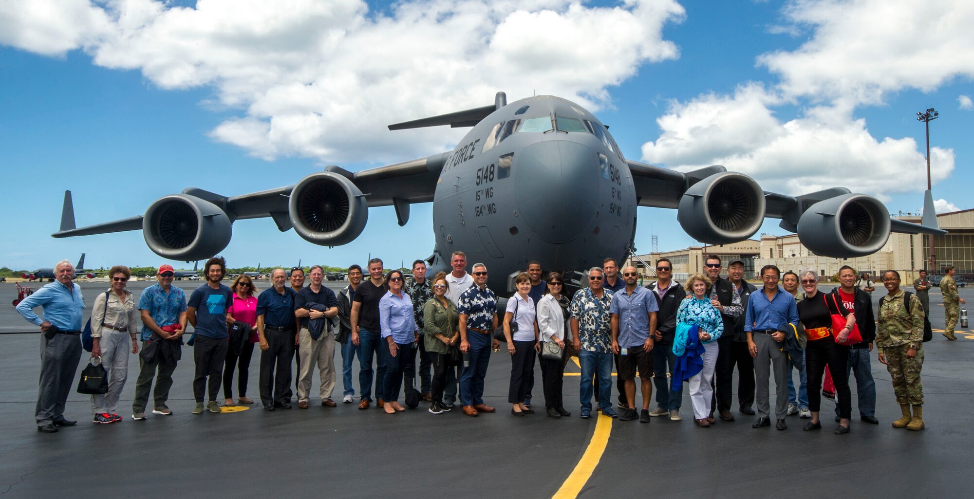 Members of the Pacific Air Forces’ Air Force Civilian Advisory Council pose for a photo in front of a C-17 Globemaster III assigned to the 535th Airlift Squadron, at Joint Base Pearl Harbor-Hickam, Hawaii, Aug. 20, 2019. Thirty-one AFCAC civic leaders attended a PACAF-hosted C-17 civic leader flight where they witnessed two refueling efforts by a KC-135 Stratofortress and one simulated C-17 cargo drop. Upon landing AFCAC observed a heritage celebration for Staff Sgt. Ryan Myers and Maj. Freddy Rodriguez’s “fini” flight. (U.S. Air Force photo by Staff Sgt. Jack Sanders)