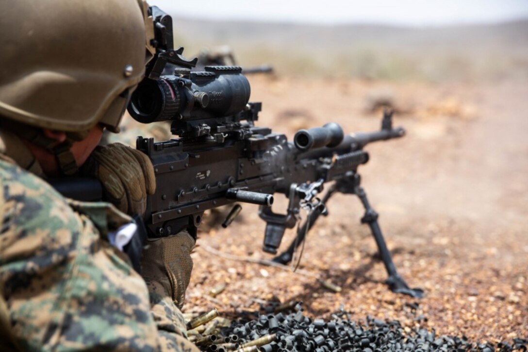 A U.S. Marine with Special Purpose Marine Air-Ground Task Force-Crisis Response-Africa 19.2, Marine Forces Europe and Africa, fires an M240B machine gun during quick-reaction force training in Thiés, Senegal, Aug. 5, 2019. The rehearsal increased the Marines’ ability to conduct link-up procedures, on scene and in-route trauma stabilization, and offensive and defensive operations. SPMAGTF-CR-AF is deployed to conduct crisis-response and theater-security operations in Africa and promote regional stability by conducting military-to-military training exercises throughout Europe and Africa. (U.S. Marine Corps photo by Cpl. Margaret Gale)