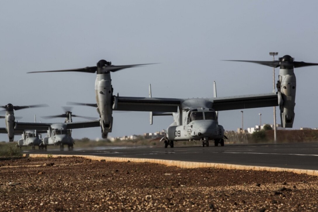 U.S. Marine Corps MV-22B Ospreys with Special Purpose Marine Air-Ground Task Force-Crisis-Response-Africa 19.2, Marine Forces Europe and Africa, arrive at a cooperative security location in Dakar, Senegal, Aug. 1, 2019. SPMAGTF-CR-AF activated the CSL to exercise forward-staging crisis response forces in Africa and rehearse responding to notional crises. (U.S. Marine Corps photo by Cpl. Margaret Gale)